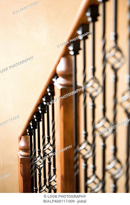 Detail of descending staircase banister