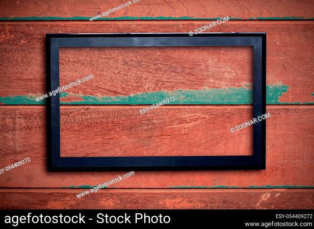 Frame of screen on the old wooden floor