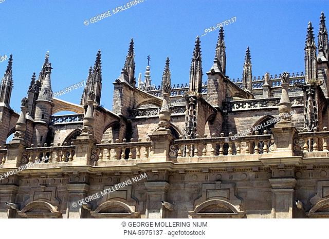 Detail of the ornate roof of the gothic cathedral of Seville, Spain