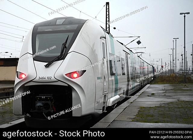 14 December 2023, Saxony, Leipzig: A model of a new S-Bahn train is presented on a track at Leipzig Central Station. The new trains are scheduled to run on the...