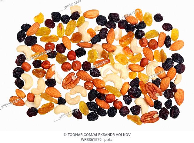 Nutritious calorie useful mix of nuts and dried fruits. Isolated on white top view studio background