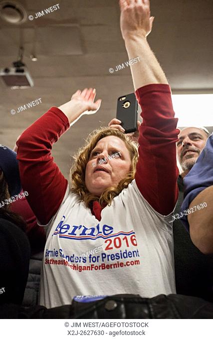 Dearborn, Michigan - Supporters of presidential candidate Bernie Sanders listen and cheer as Sanders speaks at the United Auto Workers Local 600 union hall