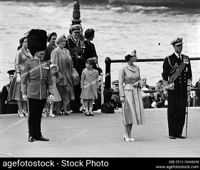 Home Again - The Queen and the Duke of Edinburgh photographed just after they had stepped ashore from the Royal Barge at Westminster Pier