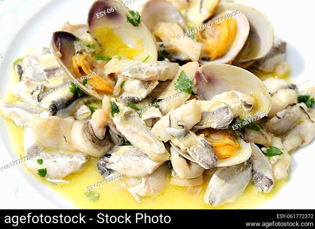 Typical dish of the Basque Country, Kokotxas with clams in green sauce
