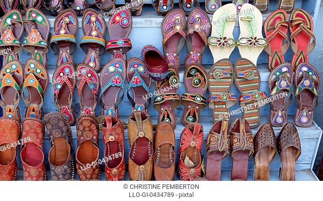 Display of traditional Indian shoes and slippers for sale in Agra, India