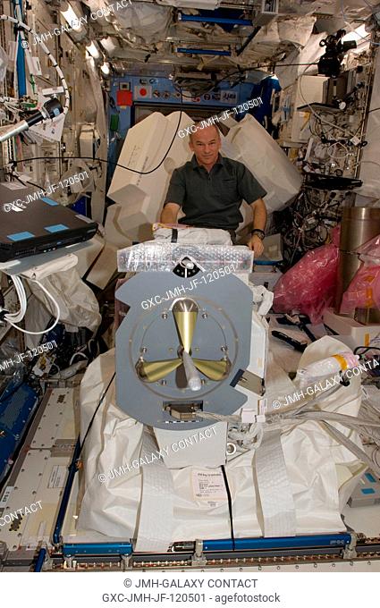 NASA astronaut Jeffrey Williams, Expedition 22 commander, assembles and configures the Japanese Experiment Module Remote Manipulator System (JEMRMS) Small Fine...