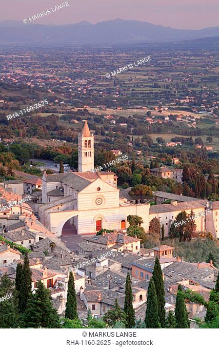 View over Assisi to Santa Chiara Basilica at sunset, Assisi, Perugia District, Umbria, Italy, Europe