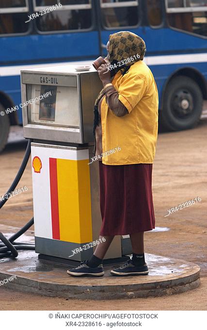 Woman by gas pum, Shashemene, Oromia Region, Ethiopia
