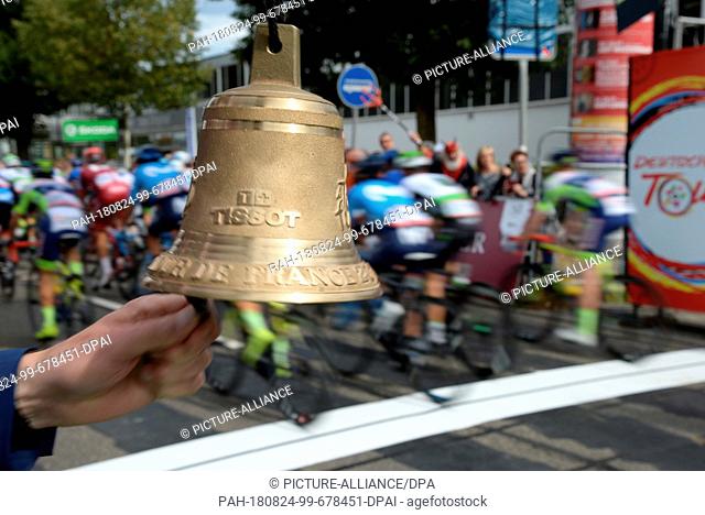 24 August 2018, Germany, Trier: Cycling, UCI European Series - Germany Tour, Bonn - Trier (196, 00 km), Stage 2: The bell will ring for the last round at the...