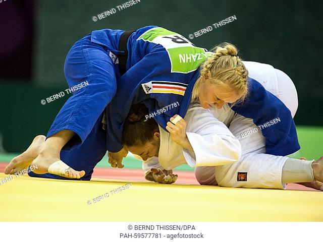 Germany's Luise Malzahn (blue) competes in the Women's -78kg Final with Marhinde Verkehr of the Netherlands at the Baku 2015 European Games in the Heydar Aliyev...