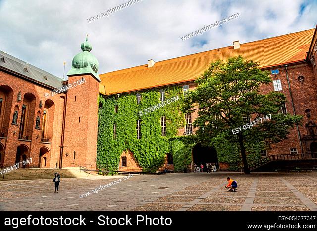 STOCKHOLM, SWEDEN - JULY 31: Scenic summer view of the City Hall castle in the Old Town (Gamla Stan) in Stockholm, Sweden on July 31, 2014