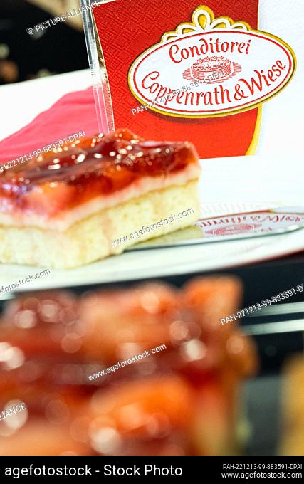 13 December 2022, North Rhine-Westphalia, Mettingen: A slice of strawberry cake from food manufacturer Coppenrath & Wiese
