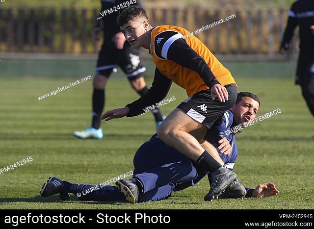 Charleroi's Anthony Descotte and Charleroi's head coach Karim Belhocine fight for the ball during the winter training camp of Belgian first division soccer team...