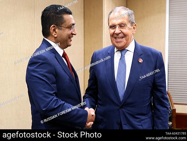 INDONESIA, JAKARTA - JULY 13, 2023: Sri Lanka's Minister of External Affairs Ali Sabry (L) and Russia's Foreign Minister Sergei Lavrov shake hands during a...