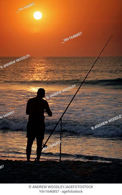 Fisherman at sunset by Boboi Beach Lodge near Kartong The Gambia
