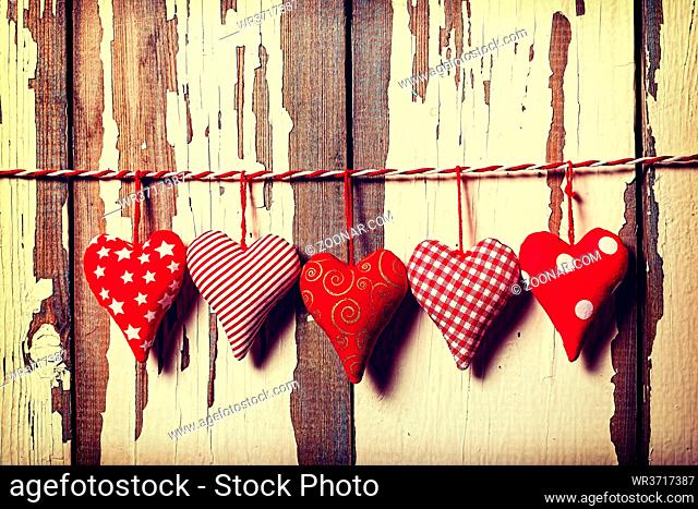 Valentine's Day. Hearts are symbols of love and romance. Copy space, wooden background, top view