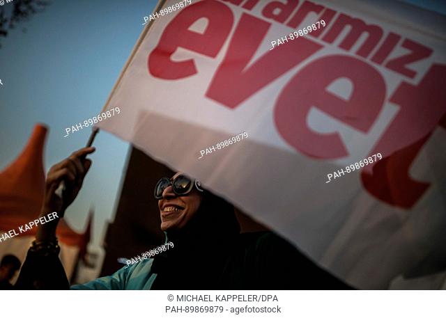 A young woman holding a Turkish flag with the word 'evet' ('yes') in Istanbul, Turkey, 14 April 2017. On Sunday 16 April 2017 the Turkish people will decide on...