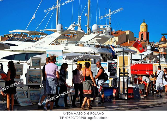 France, Saint Tropez, painters selling their art on Quai Jean Jaurés