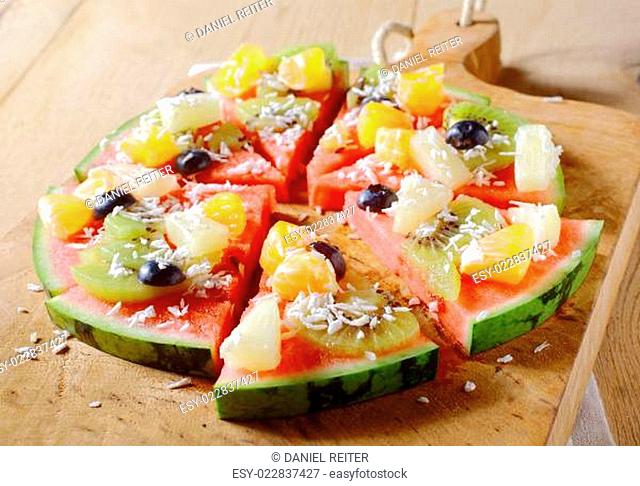 Tasty juicy tropical fruit watermelon pizza