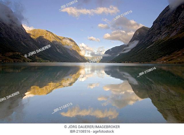 Clouds reflected in the calm water of lake Jølstravatnet, Jolstravatnet, near Skei, Klakegg, Byrkjelo, Sogn og Fjordane, Norway, Europe