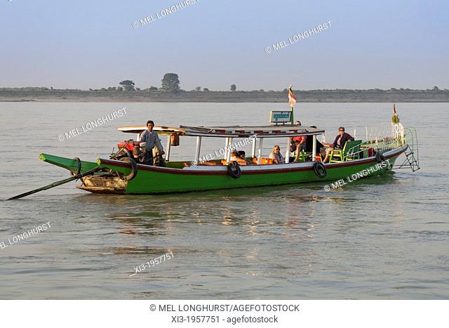 Tourists aboard a boat on the Irrawaddy River, Bagan, Myanmar, (Burma)
