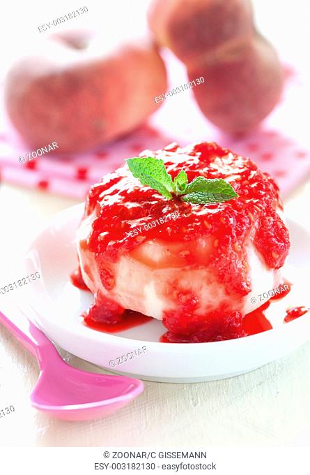 poached peach with raspberry sauce