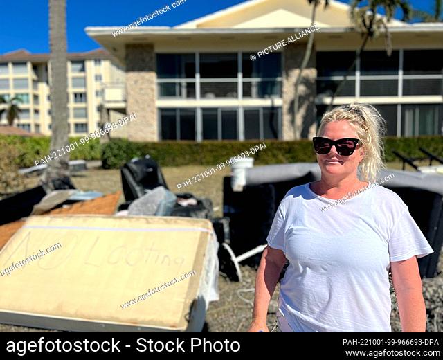 HANDOUT - 30 September 2022, US, Naples: Sheri Naegele stands in front of her vacation home on posh Gulf Shore Boulevard, just off the beach, on Sept