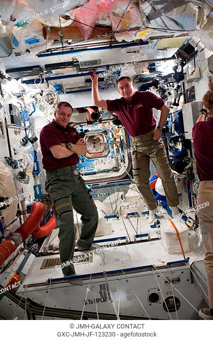 NASA astronaut T.J. Creamer (left) and Russian cosmonaut Alexander Skvortsov, both Expedition 23 flight engineers, are pictured in the Harmony node of the...