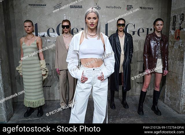 24 January 2021, Berlin: Lena Gercke (m) and models show creations by LeGer by Lena Gercke at About You Fashion Week at Kraftwerk Berlin
