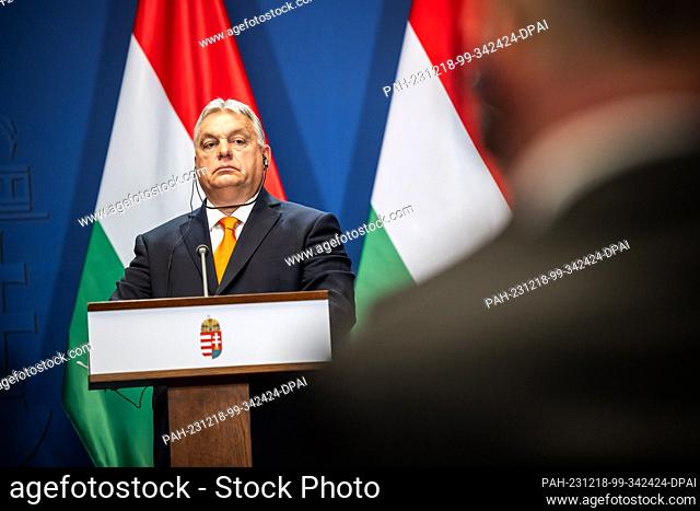18 December 2023, Hungary, Budapest: Viktor Orban (r), Prime Minister of Hungary, speaks at the Carmelite Monastery during a joint statement with Turkish...