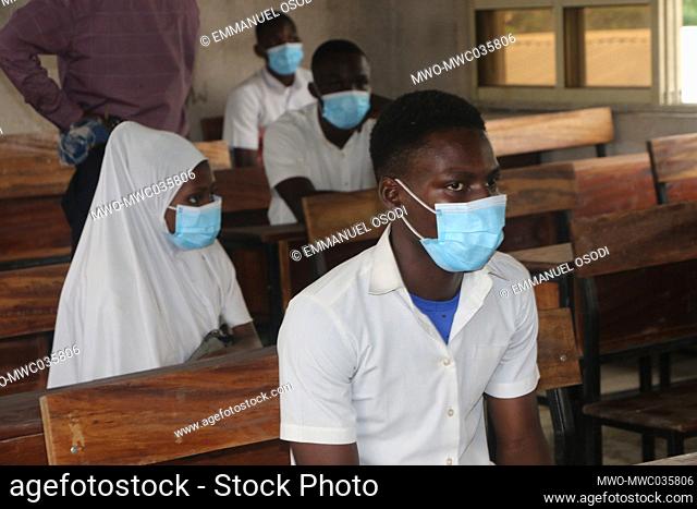 Student at Government Technical College wear mask as they sit in classroom. Schools in Nigeria have resumed amidst fear for safety with the new wave of...