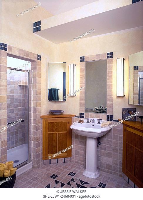 BATHROOM - Mission style oak corner cabinets, pedestal sink, and shower with glass door. Tumbled marble tiles in geometric design
