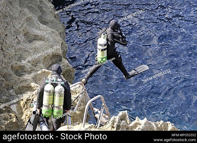 Technical Trimix Scuba Diver entering the Water, Gozo, Mediterranean Sea, Malta