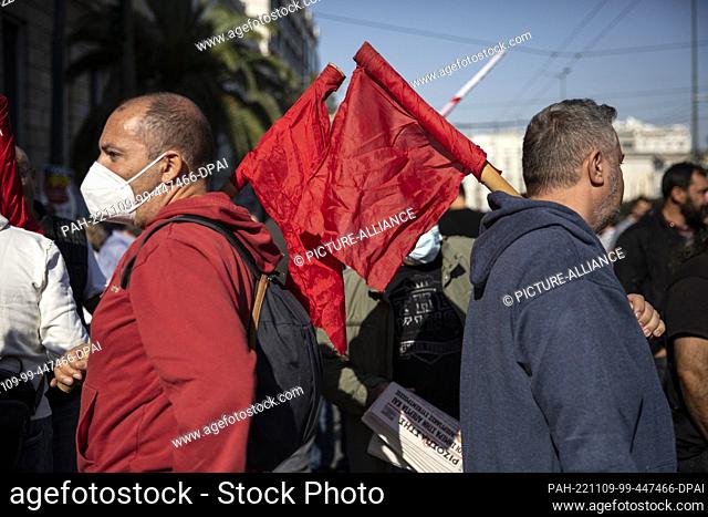 09 November 2022, Greece, Athen: Members of the communist trade union PAME protest against high prices during a 24-hour general strike in Athens