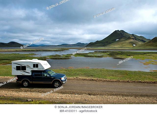Camping car, pickup truck with camper, Icelandic landscape, Highlands, Landmannalaugar, Iceland