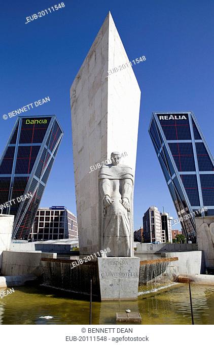 Puerta de Europa with the monument to Calvo Sotelo in the foreground at Plaza de Castilla
