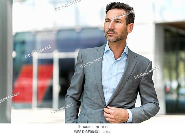 Portrait of businessman in the city