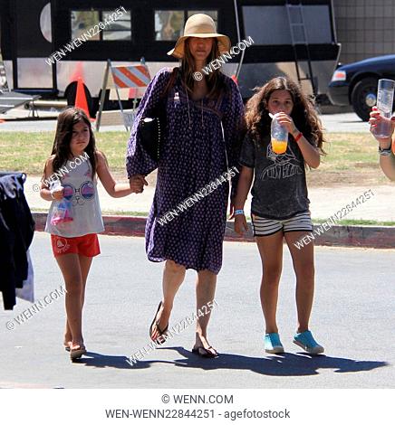 Adam Sandler wearing a large straw hat goes out and about in Malibu with his wife and daughters Featuring: Jackie Sandler, Sadie Madison Sandler