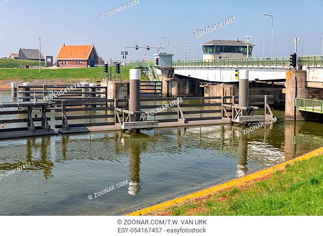 Bridge and sluice in Afsluitdijk near Kornwerderzand in the Netherlands. This is the seperation of the salt Wadden Sea and the fresh water lake IJsselmeer