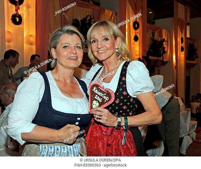 Former skier Christa Kinshofer (r) and actress Andrea Spatzek pose at the get-together of the Bavarian evening in the context of the 29th Kaiser Cup golf...