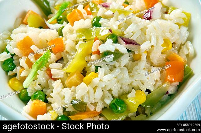 Caribbean Confetti Rice, fragrant coconut rice recipe loaded with chiles, sweet peppers, pineapple, cilantro, and spices