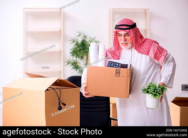 Old arab businessman in the office relocation concept