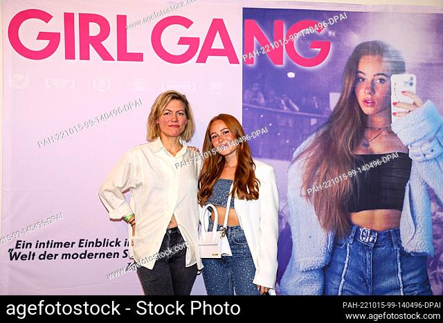 15 October 2022, Berlin: Director Susanne Regina Meures (l) and Leonie Kullik ""Leoobalys"" arrive at the premiere of the documentary Girl Gang at CineStar...