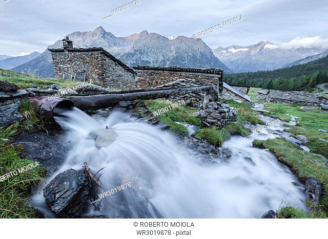 Flowing water of alpine creek, Entova Alp, Malenco Valley, Sondrio province, Valtellina, Lombardy, Italy, Europe
