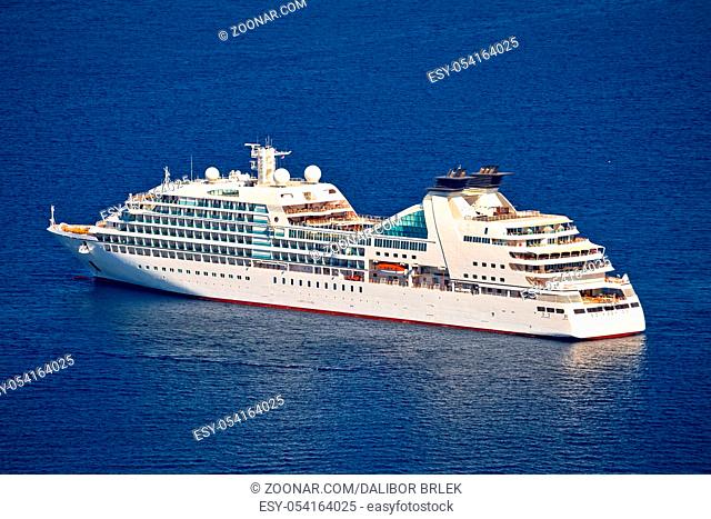 Unnamed cruise ship on blue sea aerial view, Mediterranean sailing