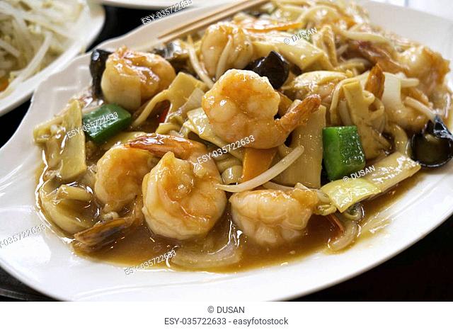 Chinese food - stir fry shrimps with vegetables and mushrooms