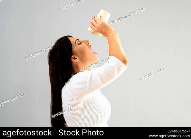 Thirsty Woman Drinking Fresh Pure Water. Person Hydration