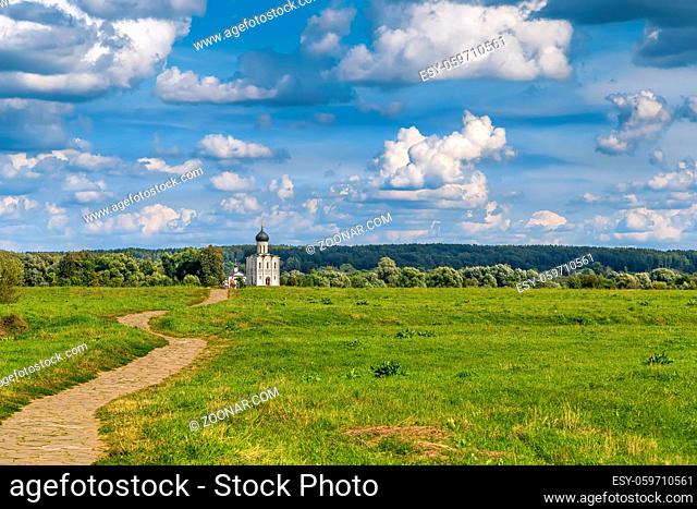 The Church of the Intercession of the Holy Virgin on the Nerl River is an Orthodox church and a symbol of medieval Russia. View from the field