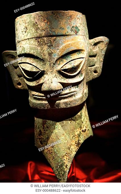 Three Thousand Year Old Bronze Mask Statue Sanxingdui Museum Chengdu Sichuan China The statues have been carbon dated to the 11th-12th Century BCE