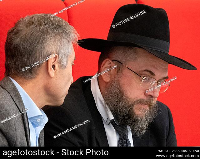 23 November 2023, Brandenburg, Potsdam: State Rabbi Ariel Kirzon (r) follows the topical hour on the topic of ""Protecting the tradition of tolerance in...